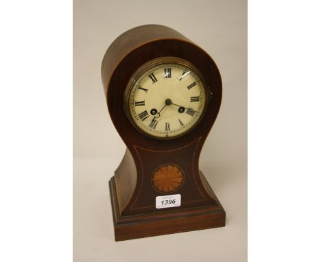 Edwardian mahogany and shell inlaid balloon shaped mantel clock with a French two train movement
