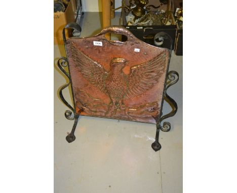 Arts and Crafts copper and wrought iron firescreen embossed with an eagle with outstretched wings