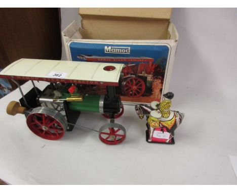 Mamod live steam tin plate traction engine with original box together with a clockwork tin plate mounted drummer
