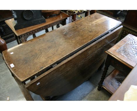 Large 18th Century oak oval gate leg table on bobbin turned supports with stretchers