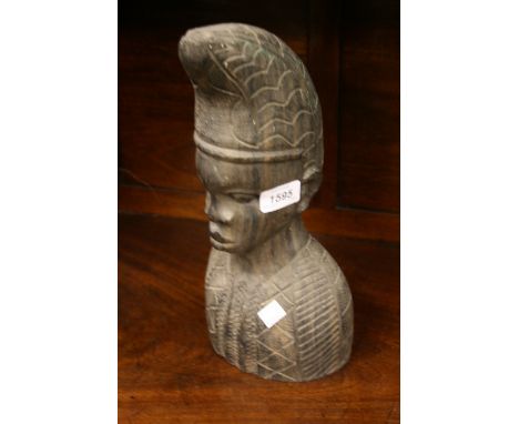 Native carved hardwood bust together with an onyx table lamp