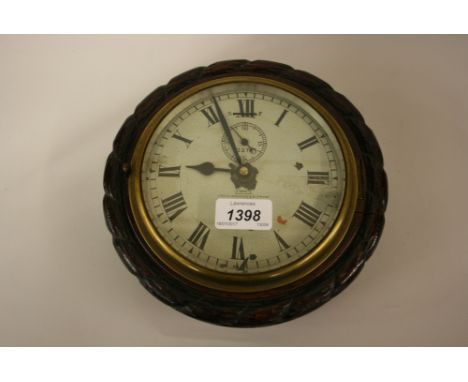 Late 19th Century circular oak clock case with enamel dial inscribed Dent, London