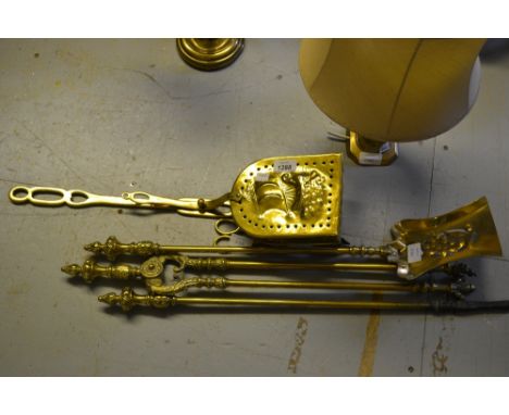 Set of three brass fire irons, chestnut roaster and a small brass lamp