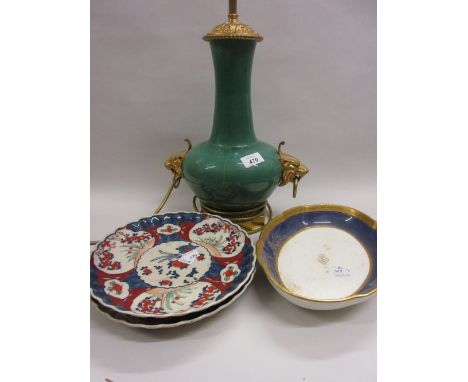 Green porcelain gilt metal mounted lamp base, Mintons gilt edged dish and two Imari plates