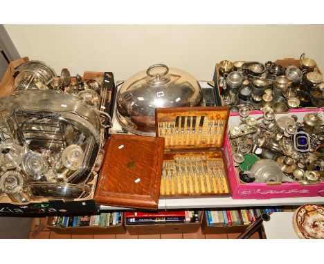 A QUANTITY OF METALWARE, including EPNS tea and coffee sets, servers, cruets, wine bottle holders, candleholders, etc, also p