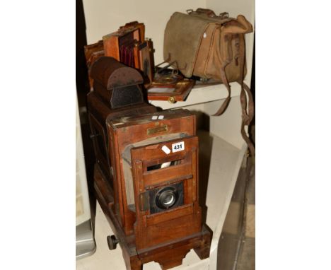 'THE WESTMINSTER' HORIZONTAL ENLARGER, converted from gas to electricity, constructed of mahogany with brass fittings and a t