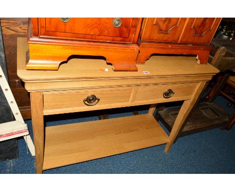 A LIGHT OAK SIDE TABLE, with two slow close drawers above an undershelf, width 110cm x depth 41cm x height 80cm