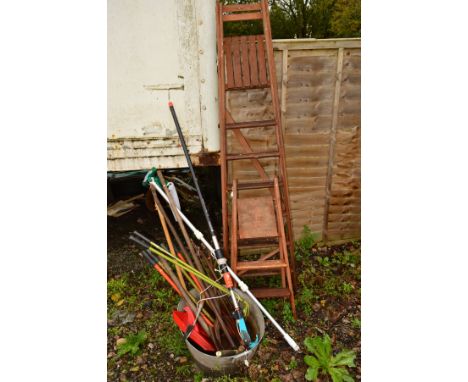 TWO WOODEN STEP LADDERS together with a galvanised bath containing various garden hand tools (10+)