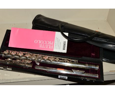 A CASED YAMAHA 611 SILVER PLATED FLUTE, with cleaning rod, care manual and soft case