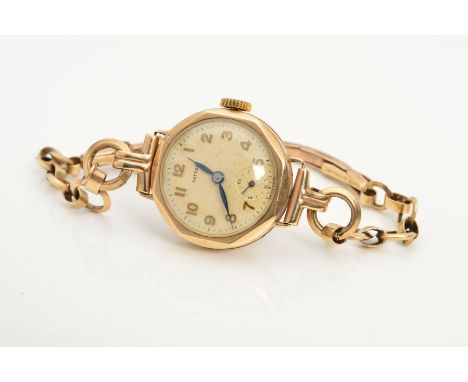 A MID 20TH CENTURY 9CT GOLD TATTON LADIES WRISTWATCH, octagonal dial measuring approximately 22mm in diameter, Arabic numeral