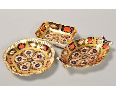 THREE ROYAL CROWN DERBY IMARI PIN/TRINKET DISHES, '1128' pattern, gold banded, (two are scratched through, seconds) (3)