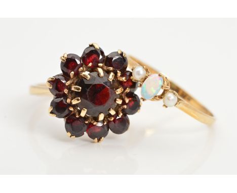 TWO 9CT GOLD GEM RINGS, the first a garnet cluster ring of circular garnets, ring size O, the second claw set with a central 