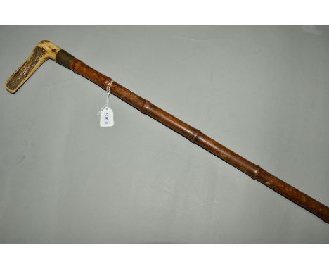 A HORN HANDLED HORSE MEASURING STICK, having measurements in 'Hands High' and cm, incorporating a brass spirit level, able to