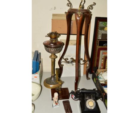 A CASED COMPOUND MICROSCOPE, a black telephone with drawer, a mahogany and brass plant stand, single burner brass and copper 