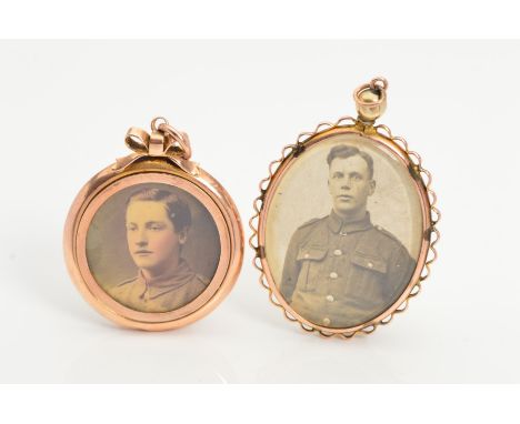 TWO EARLY 20TH CENTURY 9CT GOLD DOUBLE SIDED PHOTOGRAPH PENDANTS, the first a circular photograph pendant with bow detail, th