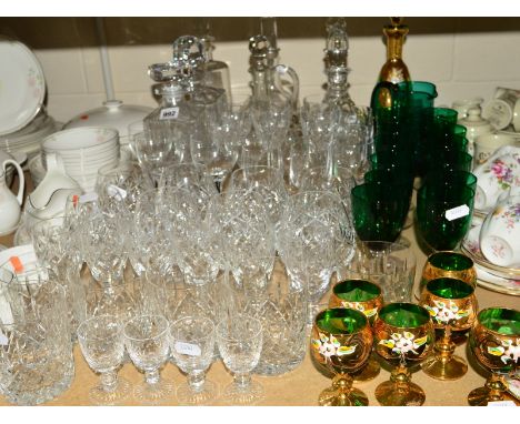 A COLLECTION OF DECANTERS, CUT GLASS WINE GLASSESS AND TUMBLERS etc, to include Stuart crystal, Bohemian glassware etc