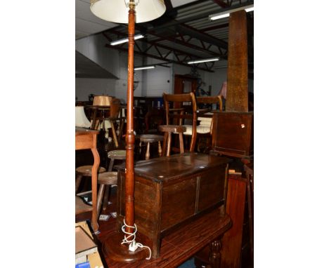 AN OAK PANELLED BLANKET CHEST, an oak standard lamp and two wall mirrors (4)