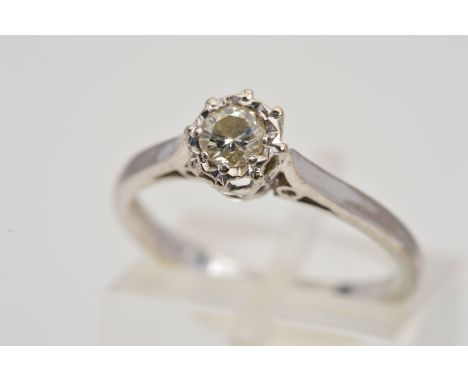 AN 18CT WHITE GOLD SINGLE STONE DIAMOND RING, designed as a brilliant cut diamond within an illusion setting, to the plain po