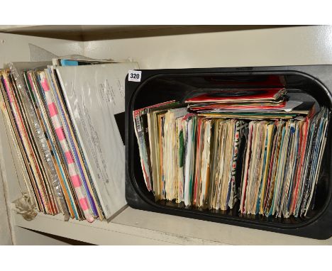 A TRAY CONTAINING OVER ONE HUNDRED AND THIRTY 7'' SINGLES, including Stevie Wonder, Michael Jackson, The Hollies, John and Yo