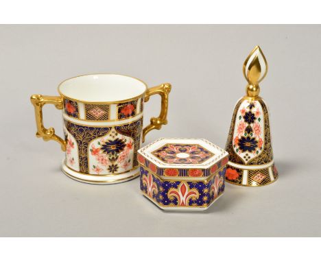 THREE PIECES ROYAL CROWN DERBY, to include '1128' pattern loving cup, height 8cm and bell shaped trinket, height 12cm and a A