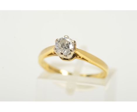 AN 18CT GOLD SINGLE ROUND DIAMOND RING, the brilliant cut diamond within a six claw setting to the tapered shoulders, stamped