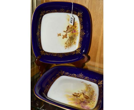 TWO SQUARE ROYAL WORCESTER DISHES, both hand painted with Partridge scenes, both having colbalt border and gilt edge and deco