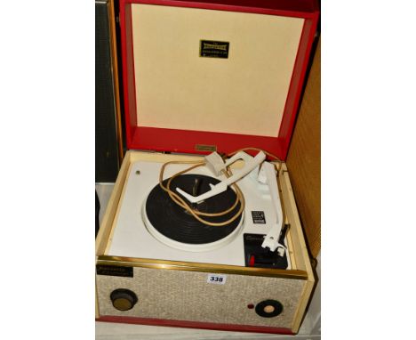 A DANSETTE CHALLENGE C101 VINTAGE RECORD PLAYER, in cream an red fitted with a Garrard Turntable (missing on/off control) (PA