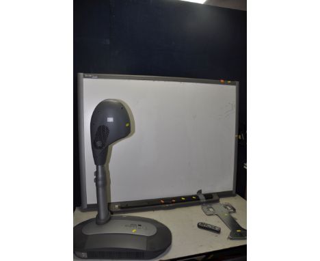 A SMART TECHNOLOGY 20-OO781-00 DLP PROJECTOR with remote and wall bracket along with a Smart Technologies SB660 smartboard wi