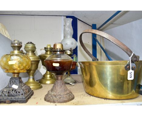 A GROUP OF OIL LAMP BASES, ELECTRIC TABLE LAMP AND BRASS JAM PAN, comprising two brass oil lamp bases with brass reservoirs, 