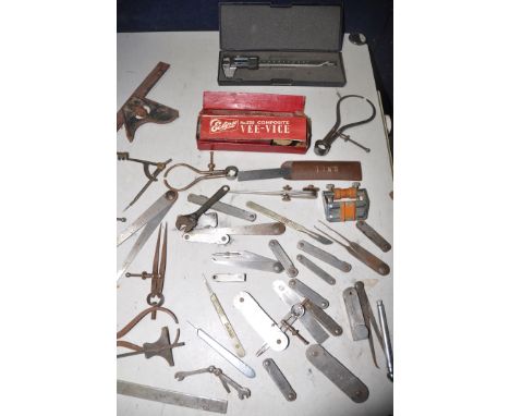 A TUB CONTAINING VARIOUS TOOLS to include a quantity of Moore and Wright of Sheffield, Starrett, Brown and Sharpe, callipers,