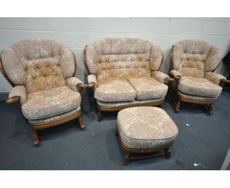 A BEECH COTTAGE LOUNGE SUITE, with floral loose cushions, comprising a sofa, and a pair of rocking chairs, and a pouffe (cond