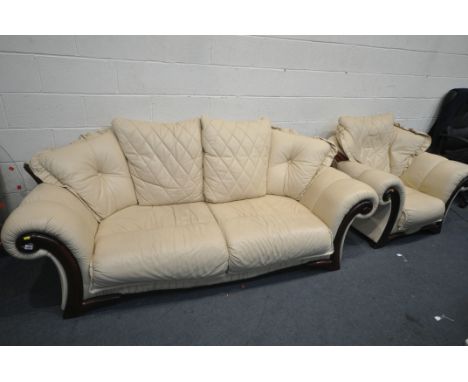 A CREAM LEATHER THREE PIECE LOUNGE SUITE, comprising a sofa, length 225cm x depth 95cm x height 93cm, and a pair of armchairs