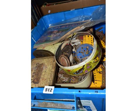 A BOX OF PLAY WORN MECCANO, THREE INSTRUCTION BOOKLETS AND A LEAFLET, the Meccano including cogs, screw, wheels and assorted 