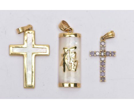 THREE YELLOW METAL PENDANTS, to include a 9ct gold tanzanite cross, hallmarked 9ct Sheffield, a mother of pearl cross, stampe