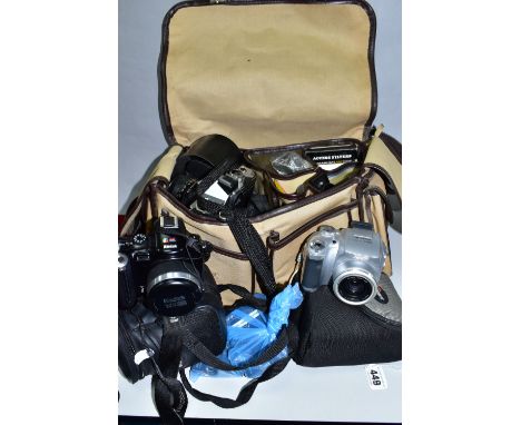 A GROUP OF CAMERAS AND PHOTOGRAPHIC EQUIPMENT, to include a Praktica MTL3 camera with f1.8 50mm lens, a cased Bell &amp; Howe