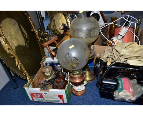 THREE BOXES OF LAMPS AND MISCELLANEOUS ITEMS, to include an early electric Singer sewing machine, two oil lamps, seven electr