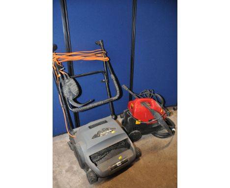 A CHAMPION CPW1600 PRESSURE WASHER with hose and lance along with a Champion SKU49545 scarifier (both PAT pass and working) a
