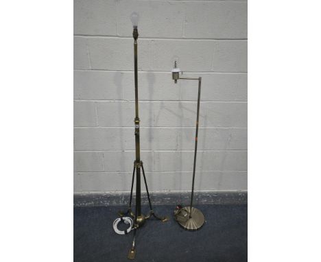 AN ARTS AND CRAFTS BRASS STANDARD LAMP, with three splayed legs (telescopic function faulty) and another brass standard lamp 