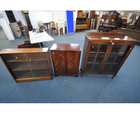 AN OAK GLAZED TWO DOOR BOOKCASE, width 92cm x depth 33cm x height 111cm (key) along with a teak glazed bookcase, and a mahoga