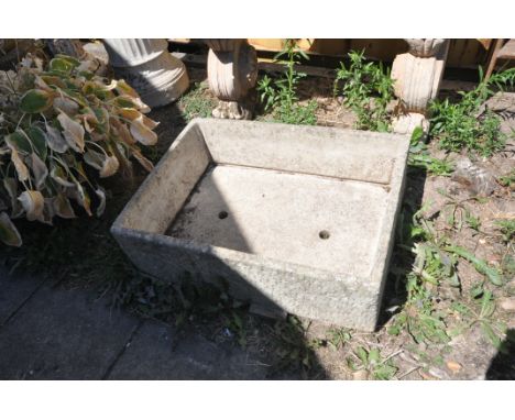A RECTANGULAR COMPOSITE GARDEN PLANTER, length 74cm x depth 56cm x height 23cm
