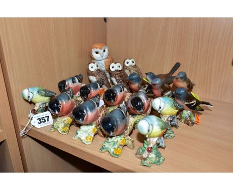 NINETEEN BESWICK GARDEN BIRDS AND OWLS, comprising three Blue Tit, no. 992, seven Bullfinch, no.1042, (one chipped to undersi