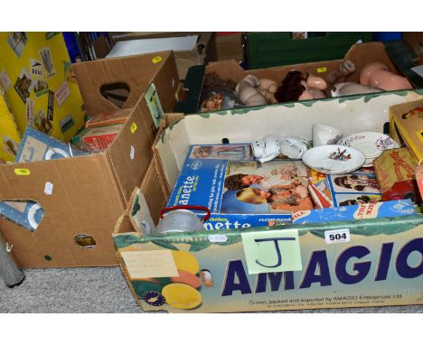 THREE BOXES OF VINTAGE DOLL INTEREST ITEMS, including a 1960s Roddy doll in a yellow card suitcase style box with two dresses