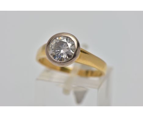 AN 18CT GOLD SINGLE STONE MOISSANITE RING, circular cut moissanite in a white metal collet setting, leading onto a polished y