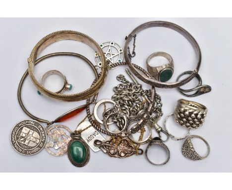 AN ASSORTMENT OF SILVER AND WHITE METAL JEWELLERY, to include two silver hinged bangles, a silver heavy keepers ring, a silve