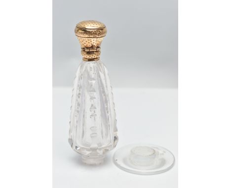 AN AF GLASS SCENT BOTTLE, tapered cut glass bottle, separated from a round glass base, fitted with a yellow metal floral engr