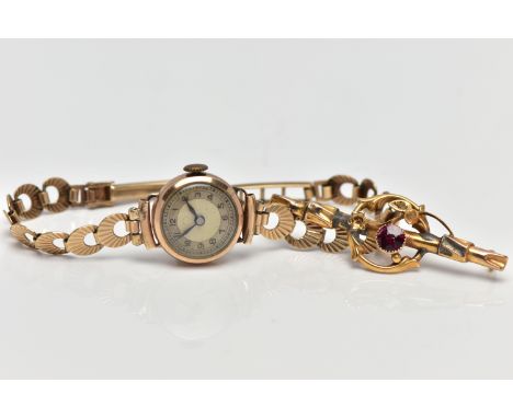 A LADIES MID 20TH CENTURY 9CT GOLD WRISTWATCH AND 9CT GOLD TOURMALINE BROOCH AF, the first a ladies wristwatch with circular 
