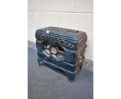 A SMALL FRENCH TURQUOISE ENAMEL CAST IRON STOVE, stamped Faure Revin, with a pierced hinged lid, a door on  the right hand si