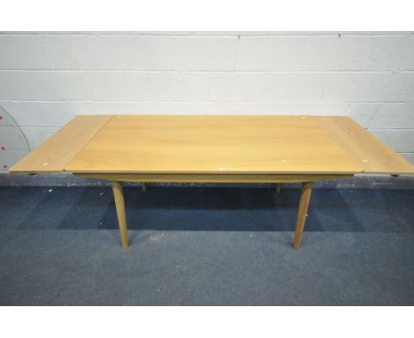 A JOHN LEWIS LIGHT OAK DINING TABLE, with two additional leaves/drawers, on cylindrical tapered legs, open length 220cm x clo