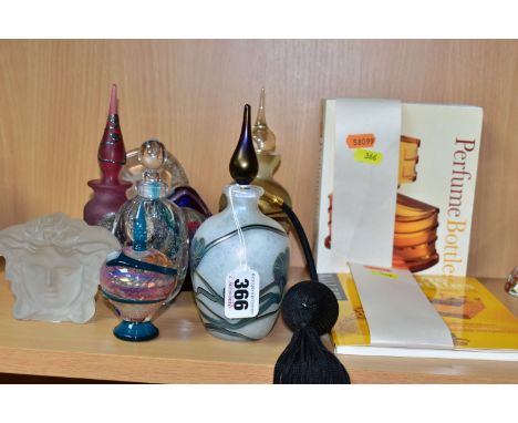 A COLLECTION OF DECORATIVE GLASS PERFUME BOTTLES, REFERENCE BOOKS AND TWO PAPERWEIGHTS, including an iridescent Okra atomiser