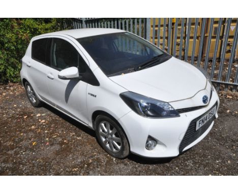 A TOYOTA YARIS HYBRID ICON CVT CAR, in white, hybrid electric, 1497cc petrol engine, automatic, five door hatchback, date of 